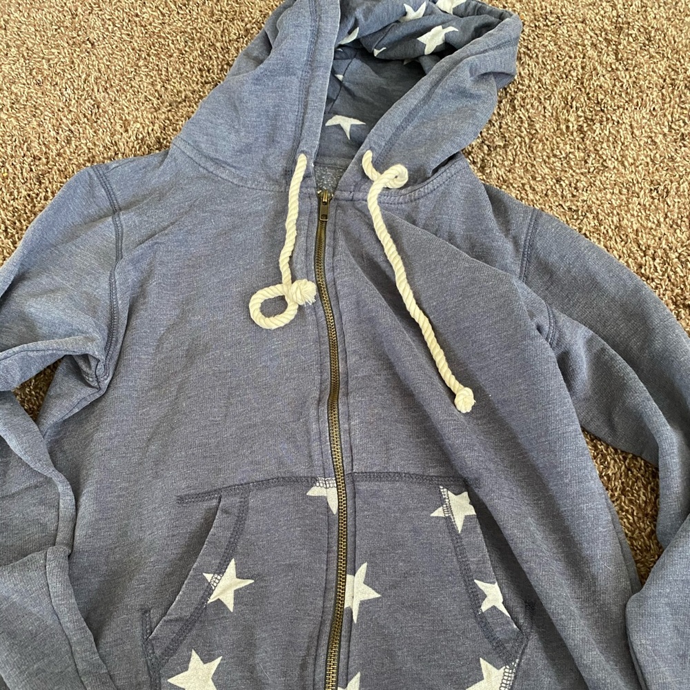 Zip up sweatshirt with star detailing